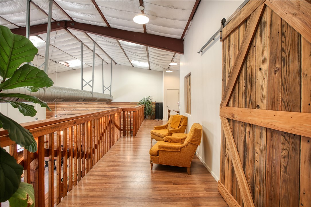 15050 Morro Road Atascadero, CA 93422 - Photo 23 of 33 a balcony with chairs and wooden floor