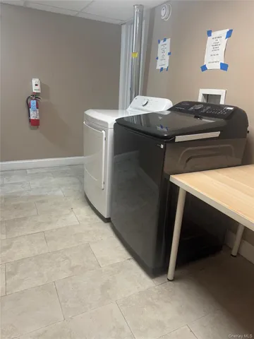 a kitchen with a stove and a refrigerator
