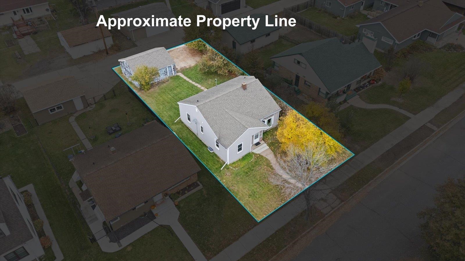 813 6th Street South Virginia, MN 55792 - Photo 11 of 44 Aerial view of residential area with property parcel outlined