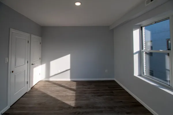 a view of an empty room and window