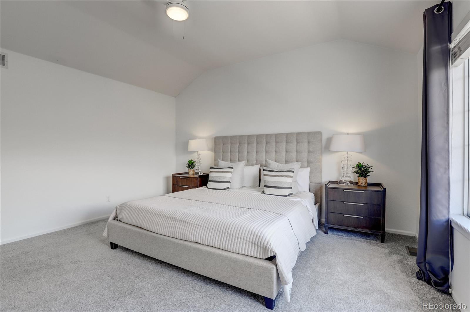 6120 Trailhead Road Highlands Ranch, CO 80130 - Photo 14 of 29 a bedroom with a bed and window