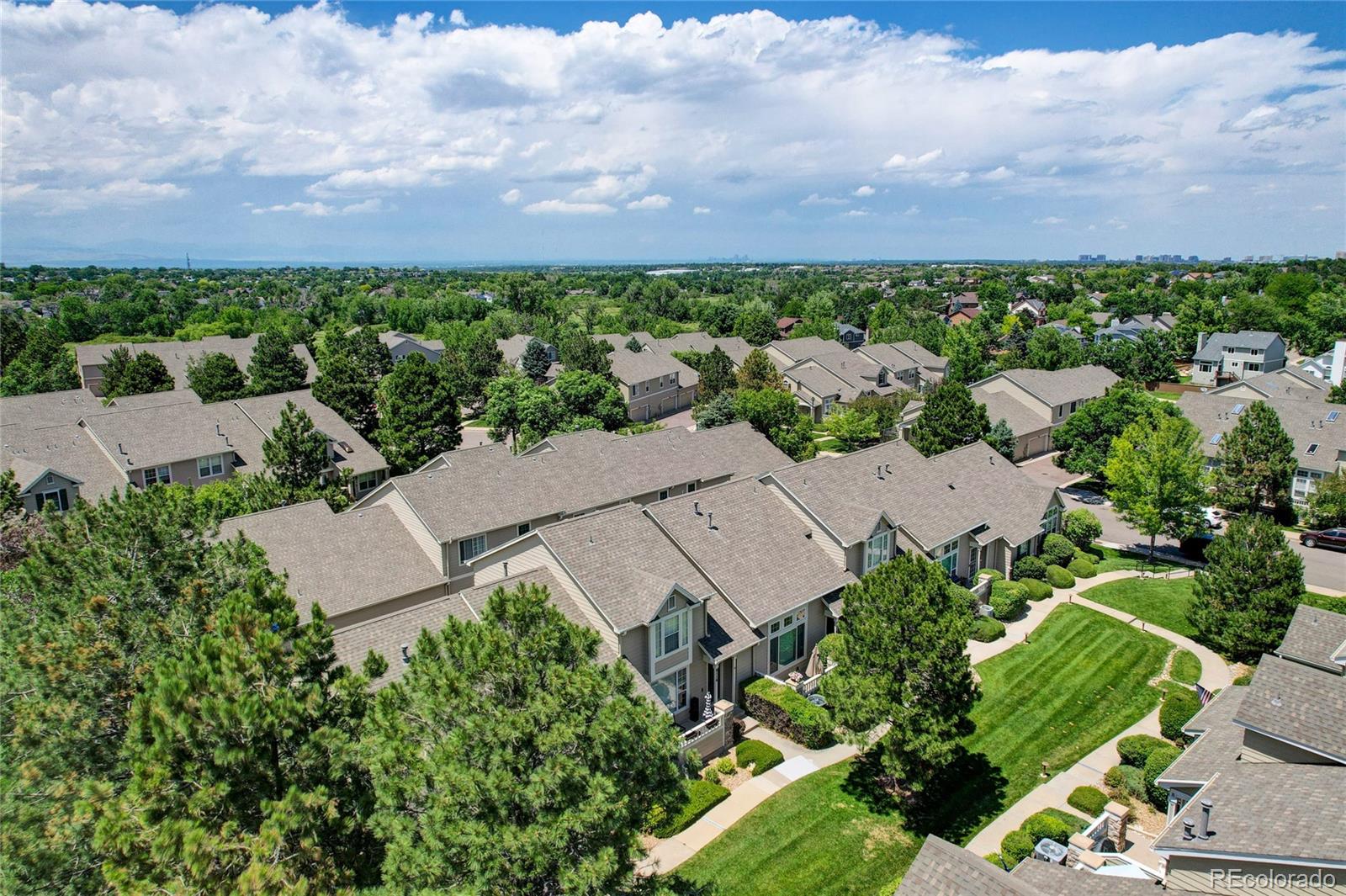 6120 Trailhead Road Highlands Ranch, CO 80130 - Photo 23 of 29 an aerial view of a house with lots of trees in the background
