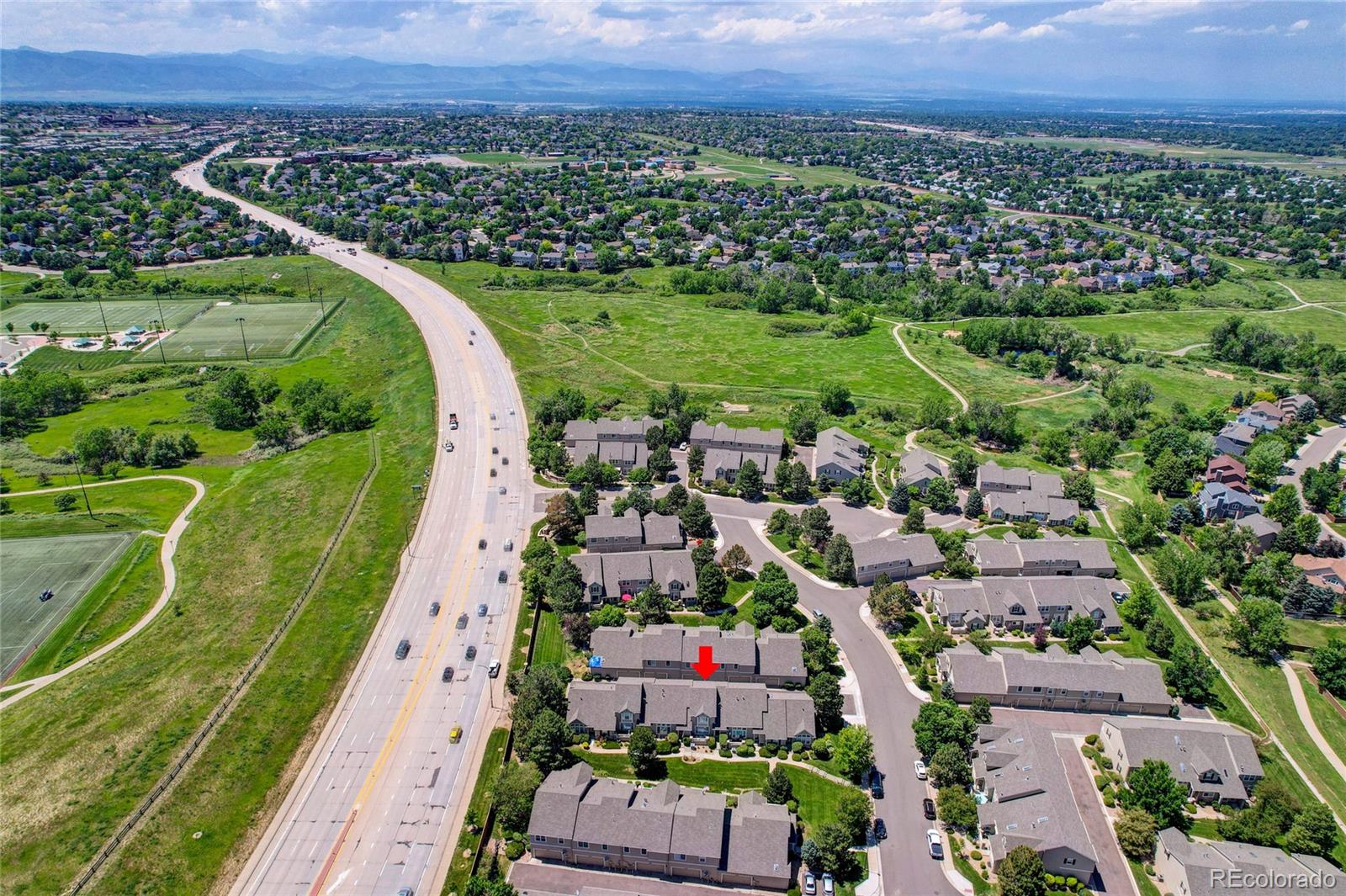 6120 Trailhead Road Highlands Ranch, CO 80130 - Photo 24 of 29 an aerial view of a city with lots of residential buildings