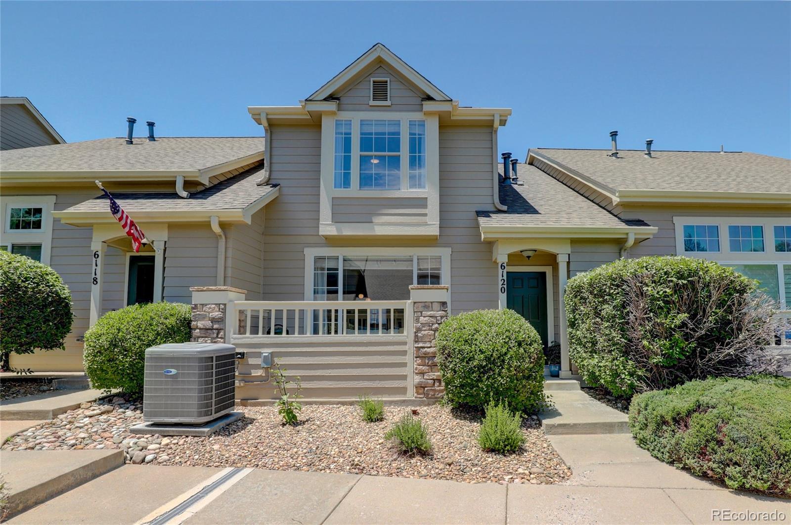 6120 Trailhead Road Highlands Ranch, CO 80130 - Photo 29 of 29 a front view of a house with garden