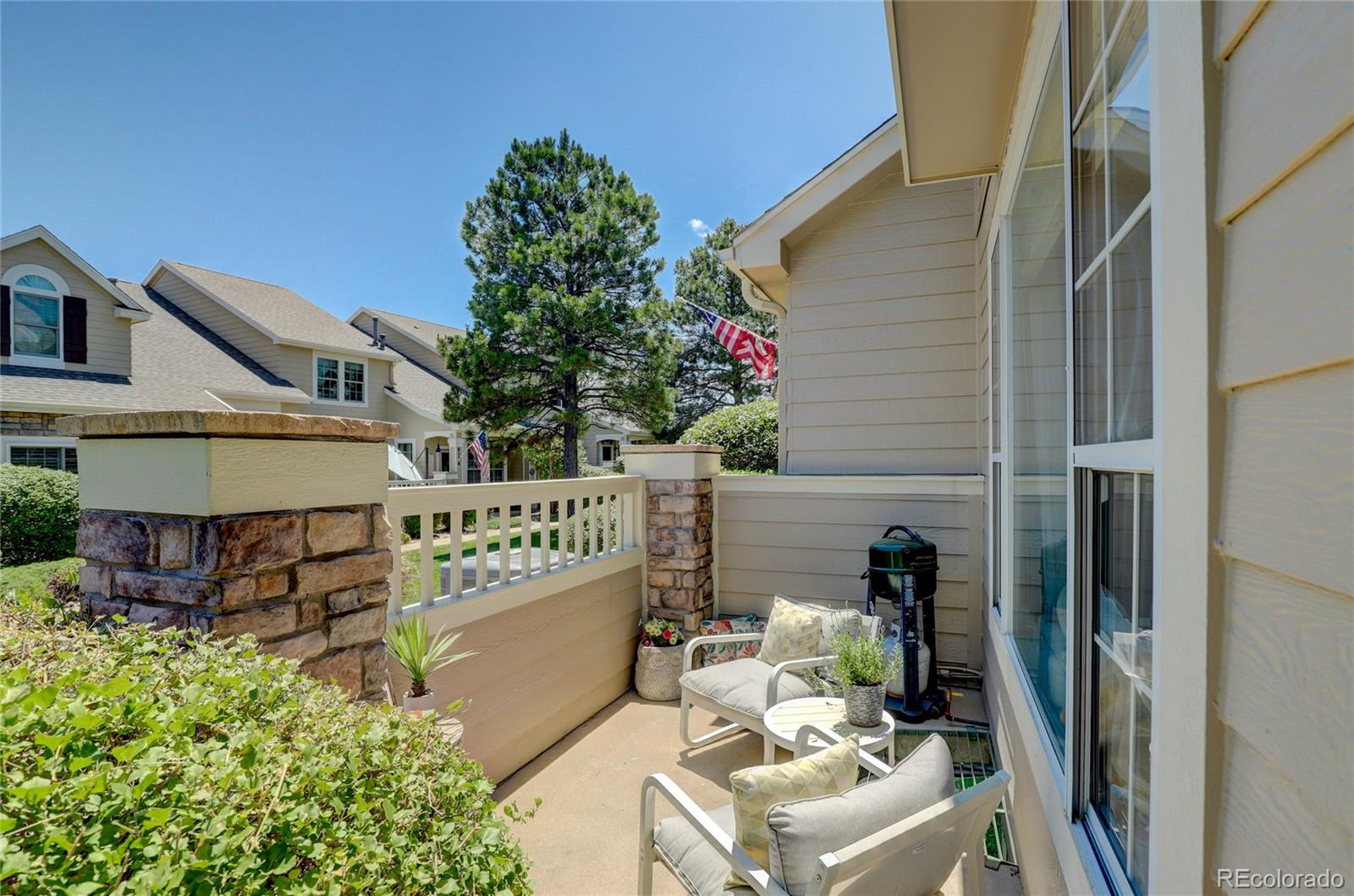 6120 Trailhead Road Highlands Ranch, CO 80130 - Photo 3 of 29 a view of a chairs and table in the balcony