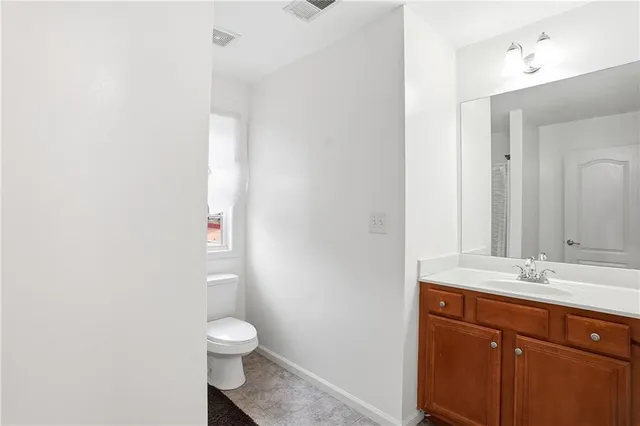 a view of a livingroom with furniture and a fireplace