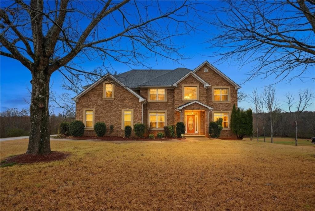 60 Heritage Keep Covington, GA 30016 - Photo 3 of 48 a front view of a house with a yard
