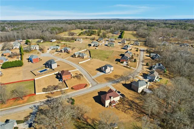 an aerial view of a building with outdoor space