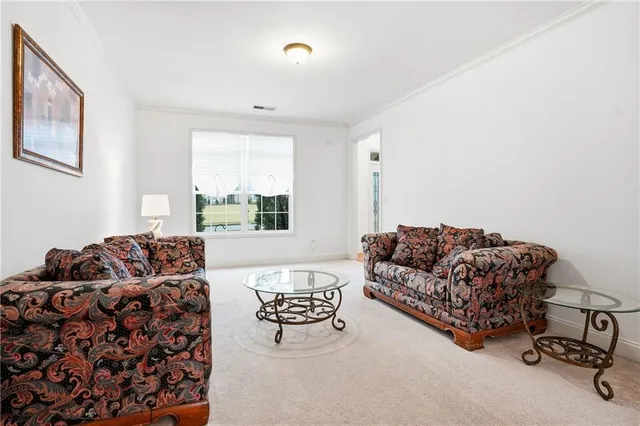 a living room with furniture and a couch