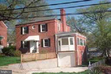 5308 Tilden Road Bladensburg, MD 20710 - Photo 1 of 1 a front view of a house with a garden