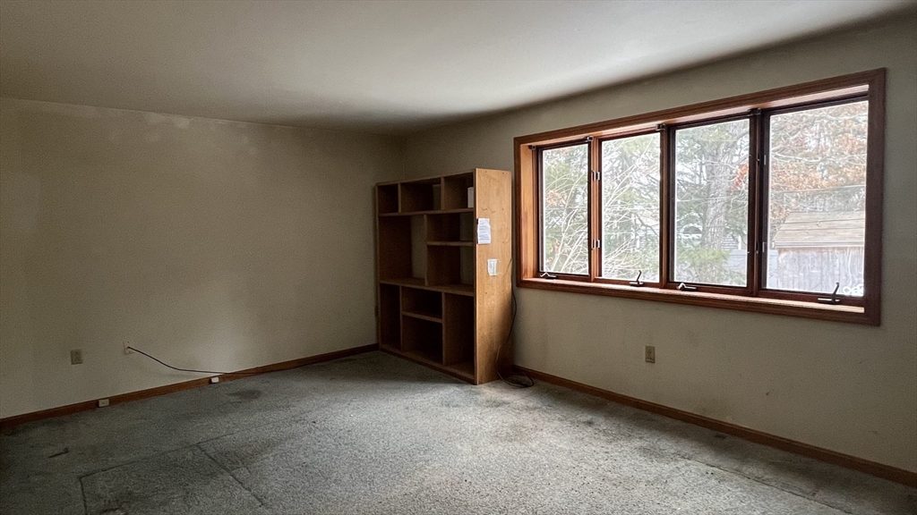 50 Head Of The Bay Road Bourne, MA 02532 - Photo 9 of 17 an empty room with windows