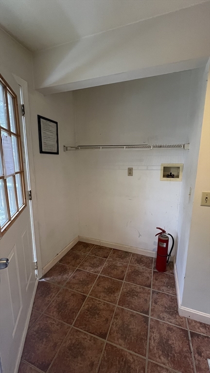 50 Head Of The Bay Road Bourne, MA 02532 - Photo 10 of 17 a room with water heater and a wooden floor