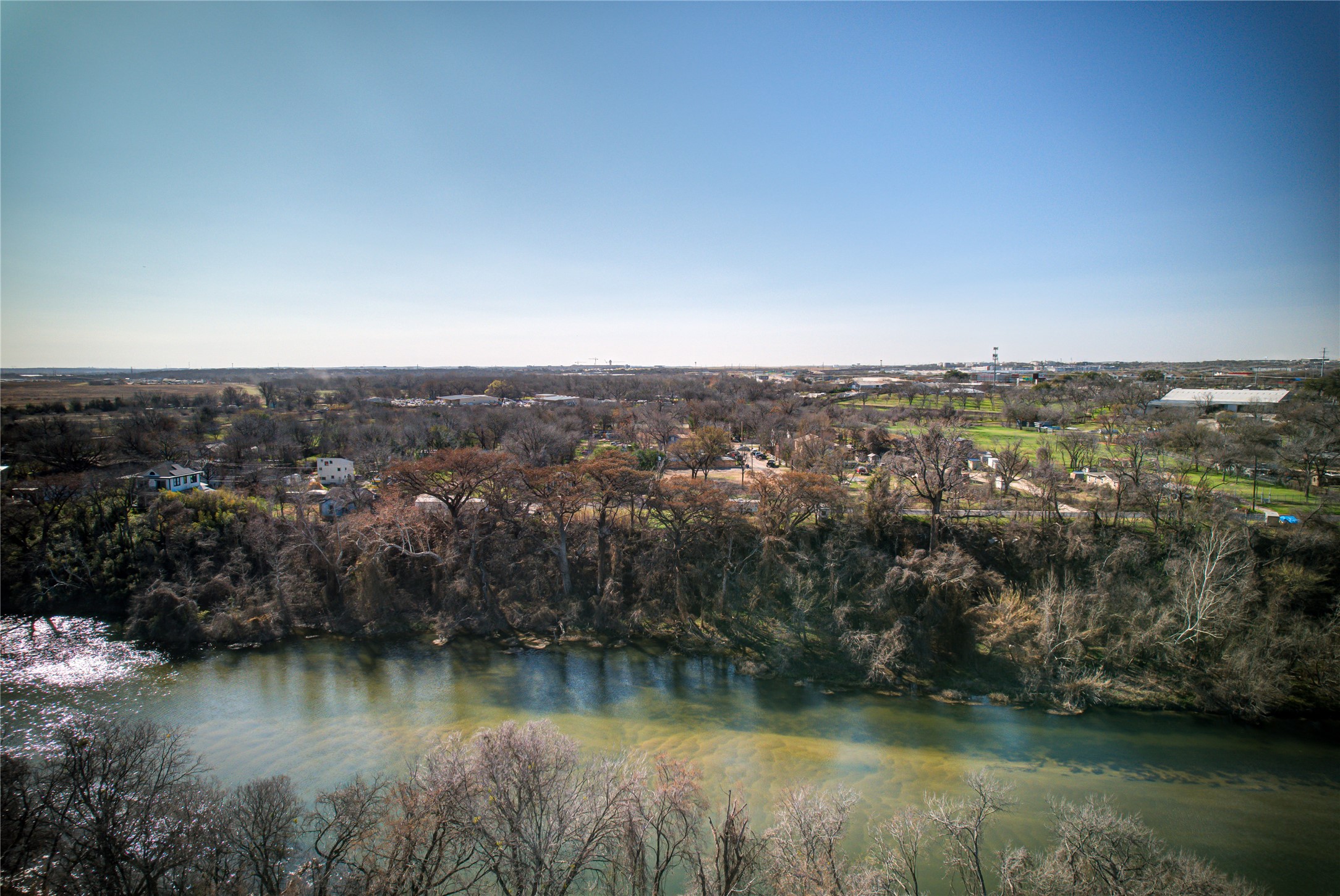 109 Kimble Lane Austin, TX 78742 - Photo 9 of 9 an aerial view of residential house with outdoor space and lake view