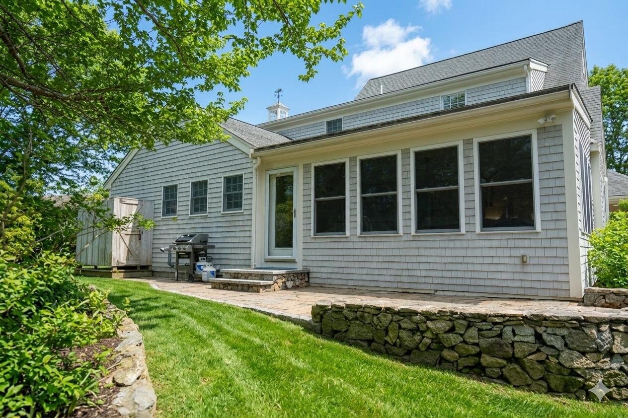 10 Abbey Gate Road Cotuit, MA 02635 - Photo 4 of 67 a view of house with yard