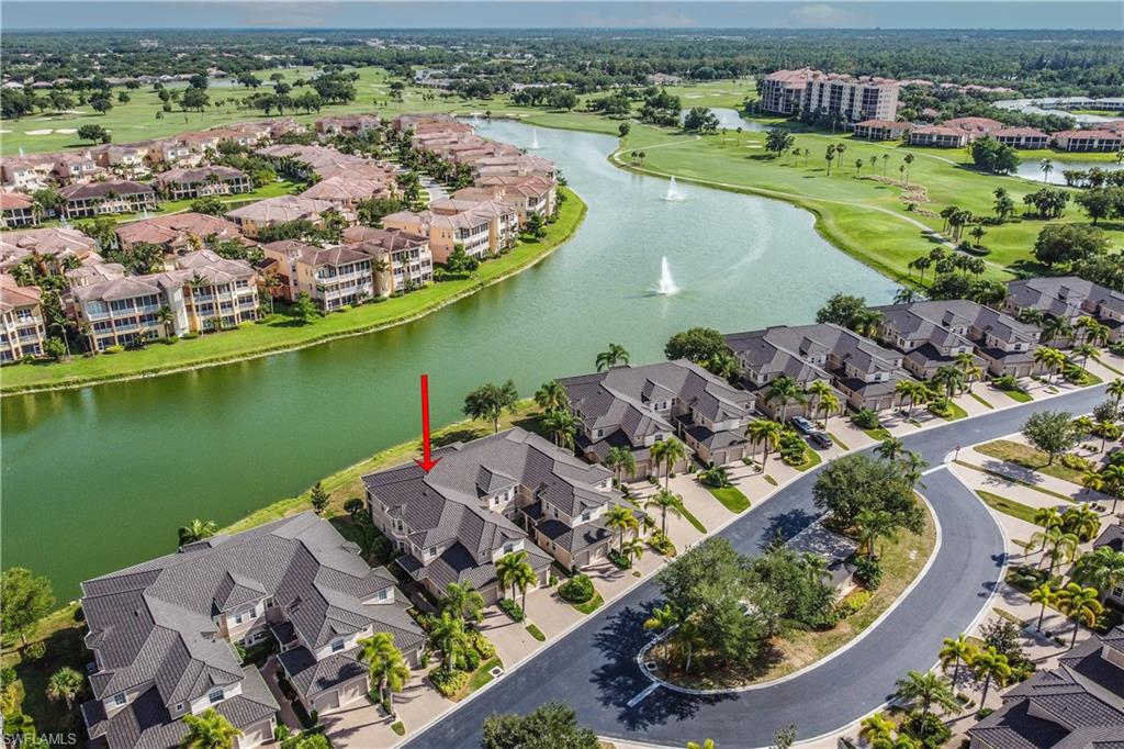 722 Regency Reserve Circle, Unit 3001 Naples, FL 34119 - Photo 18 of 22 an aerial view of a house with a lake view