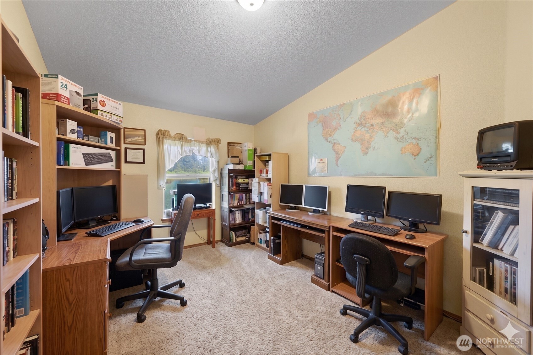 7928 Portal Way Custer, WA 98240 - Photo 10 of 39 a view of a workspace with furniture and a window
