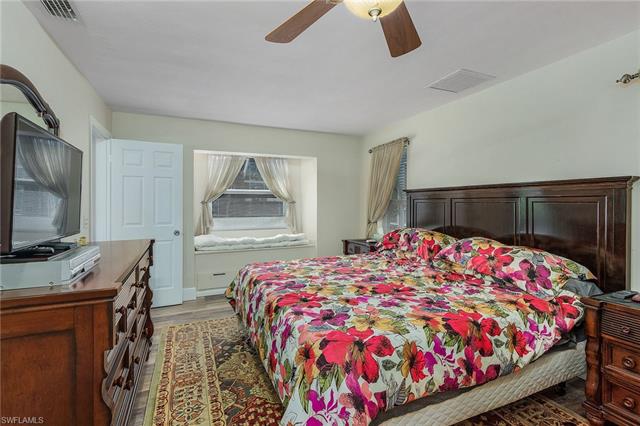 8522 Lagoon Road Fort Myers Beach, FL 33931 - Photo 24 of 32 Master Bedroom, view of pool and canal from your window.