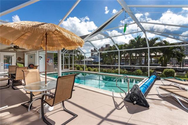 8522 Lagoon Road Fort Myers Beach, FL 33931 - Photo 10 of 32 Heated pool with plenty of space for entertaining, Southern exposure to enjoy the Sun and work on your Tan year round.