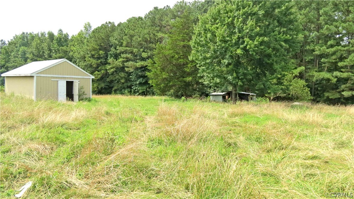 11500 Beach Road Chesterfield, VA 23832 - Photo 27 of 29 a view of backyard with garden and deck