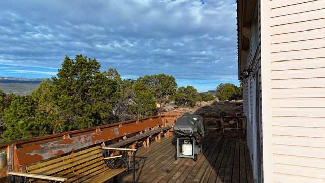 358 South Sky Drive Torrey, UT 84775 - Photo 12 of 82 Wood deck with perimeter railing and built-in bench seating