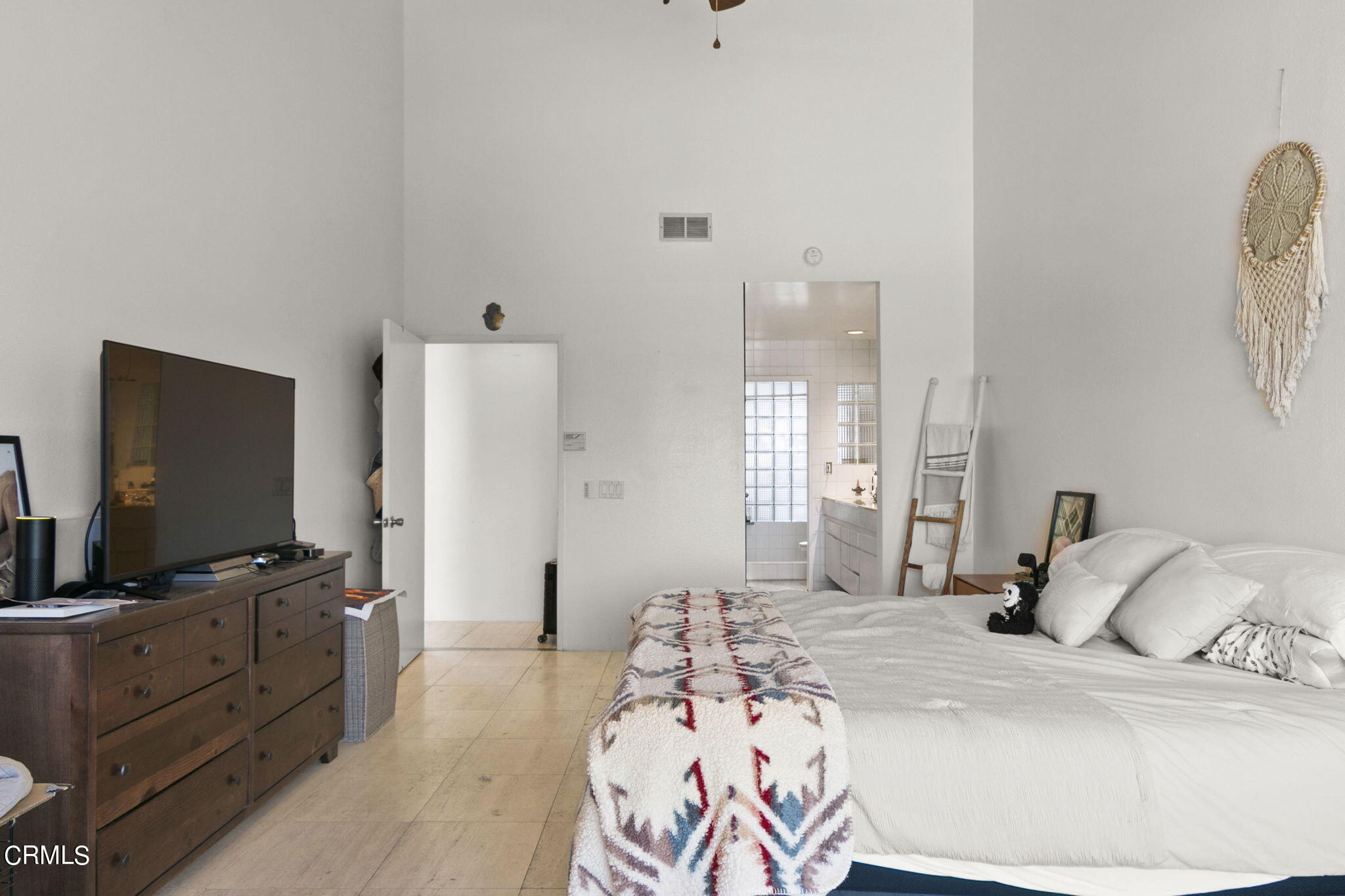 3334 Sunset Lane Oxnard, CA 93035 - Photo 20 of 37 a bedroom with a bed and a flat screen tv