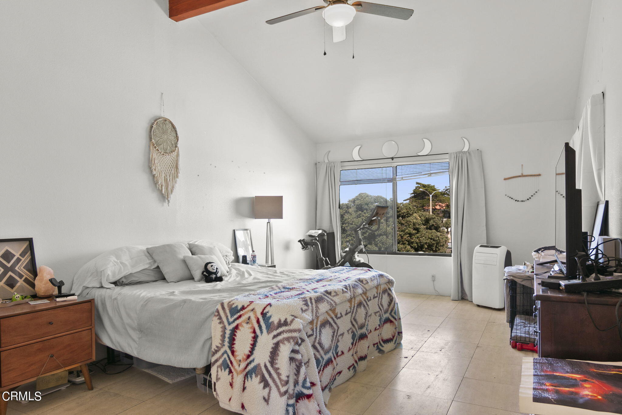 3334 Sunset Lane Oxnard, CA 93035 - Photo 21 of 37 a bedroom with a bed and a flat screen tv