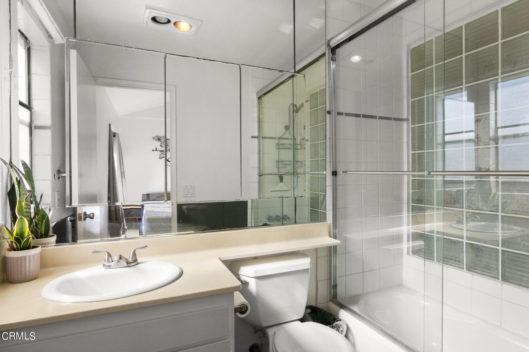 3334 Sunset Lane Oxnard, CA 93035 - Photo 25 of 37 a bathroom with a sink toilet and shower