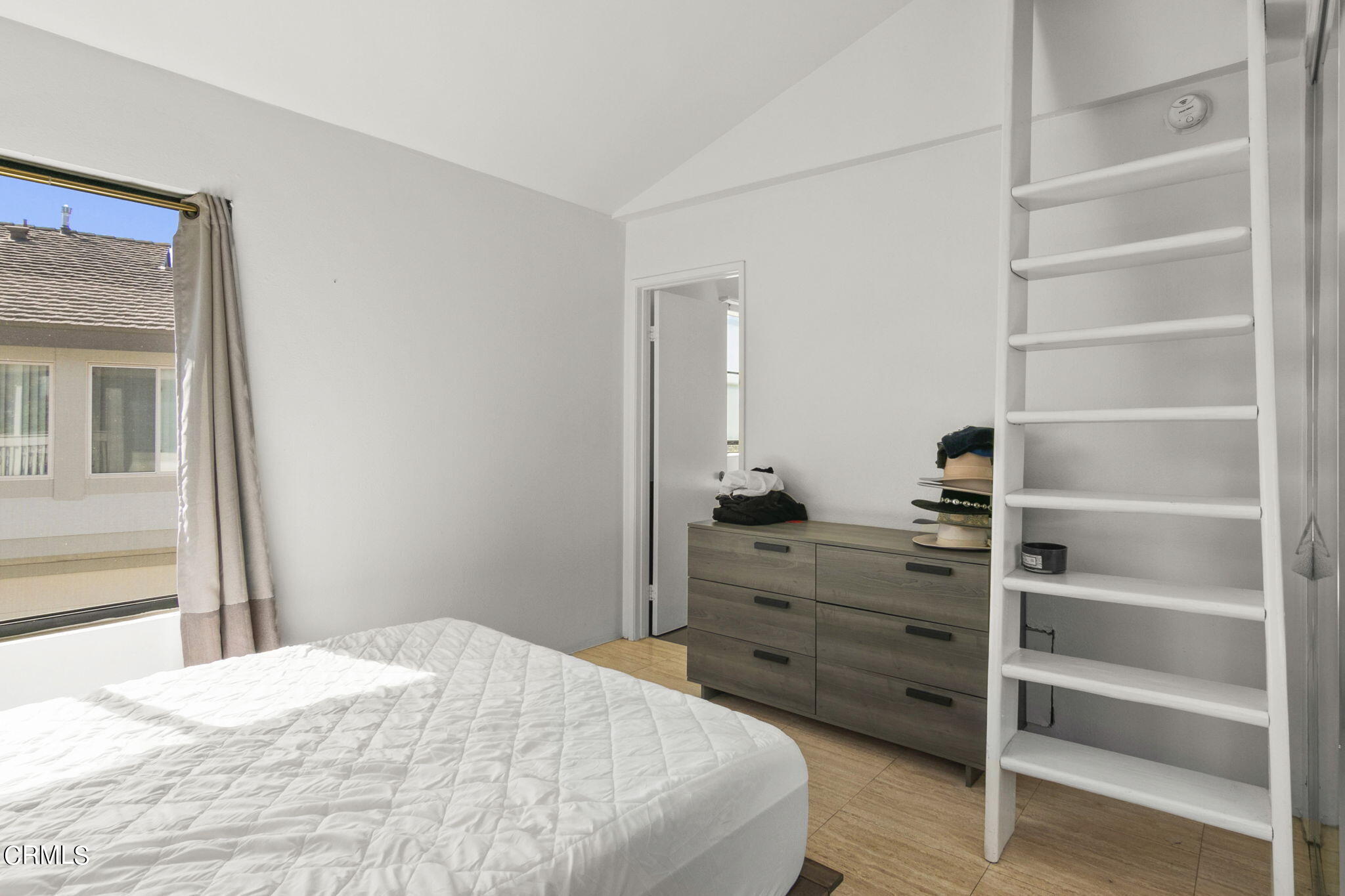 3334 Sunset Lane Oxnard, CA 93035 - Photo 27 of 37 a bedroom with a bed and a cabinets