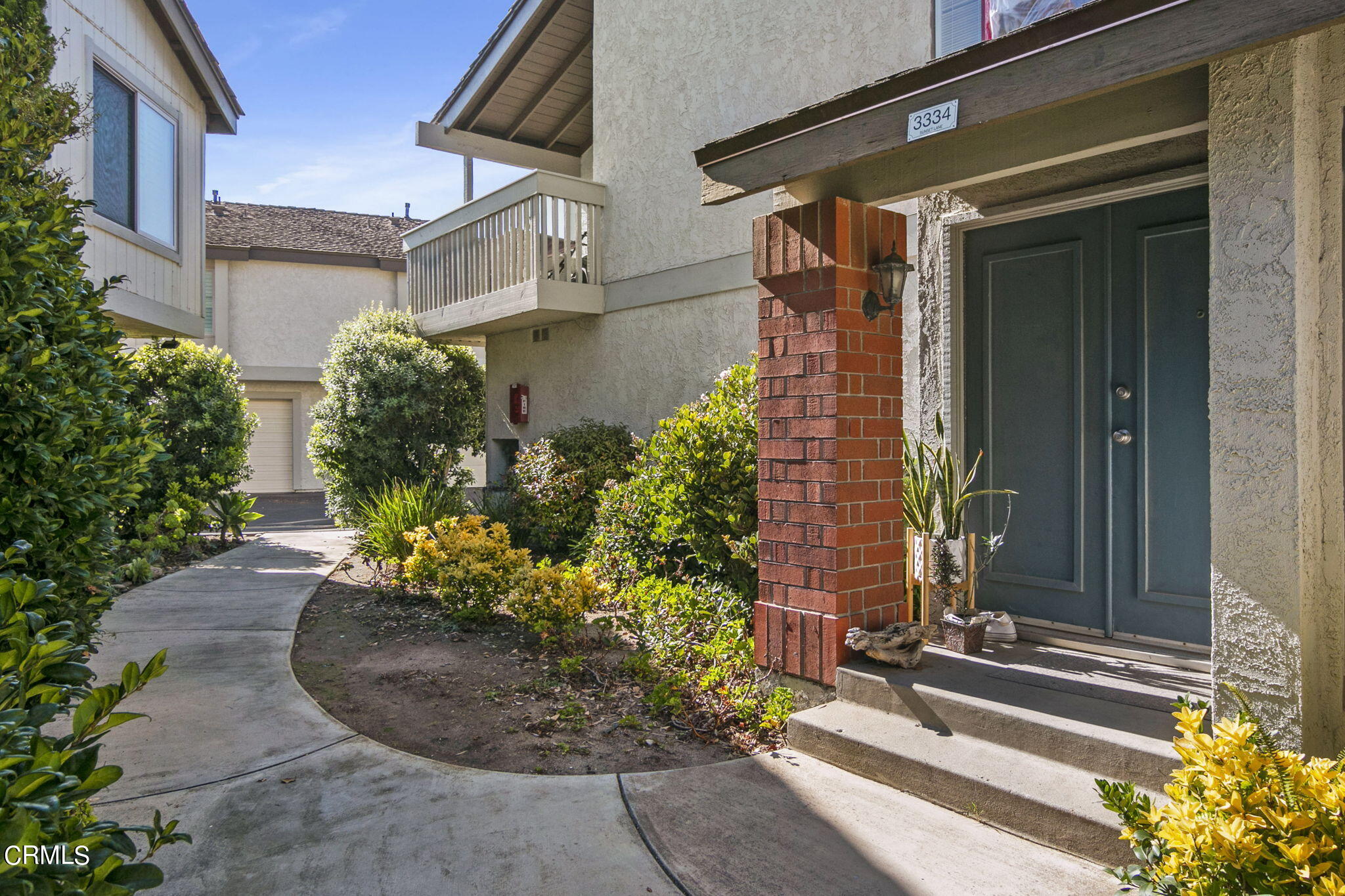 3334 Sunset Lane Oxnard, CA 93035 - Photo 4 of 37 a front view of a house with a yard