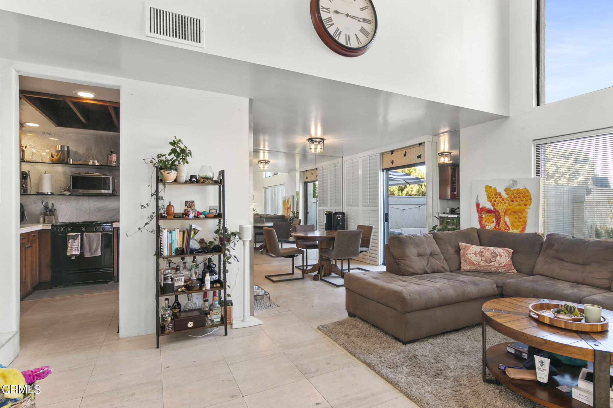 3334 Sunset Lane Oxnard, CA 93035 - Photo 6 of 37 a living room with furniture and a chandelier