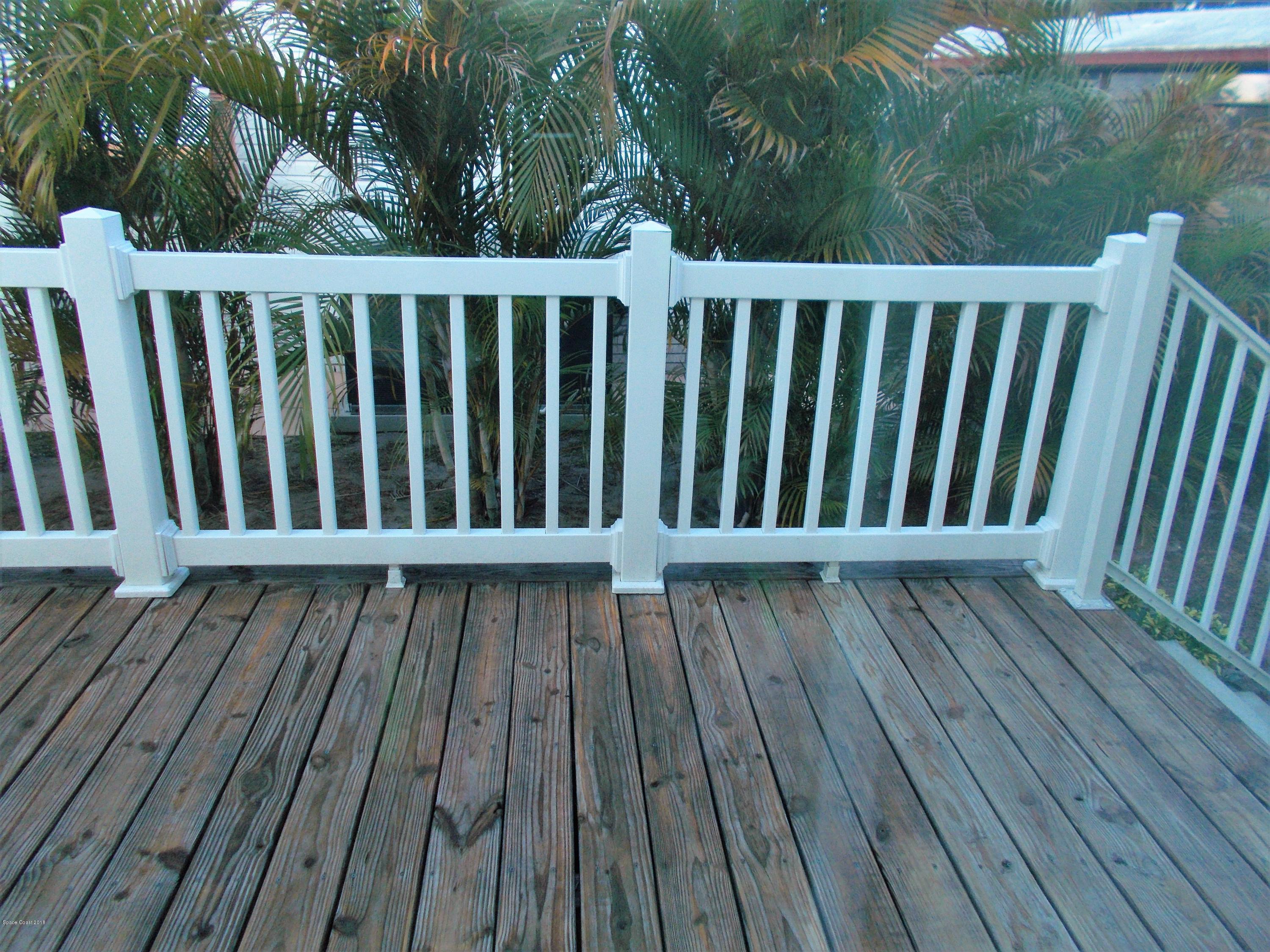 1054 Sebastian Road Barefoot Bay, FL 32976 - Photo 12 of 24 PORCH OF MASTER BEDROOM