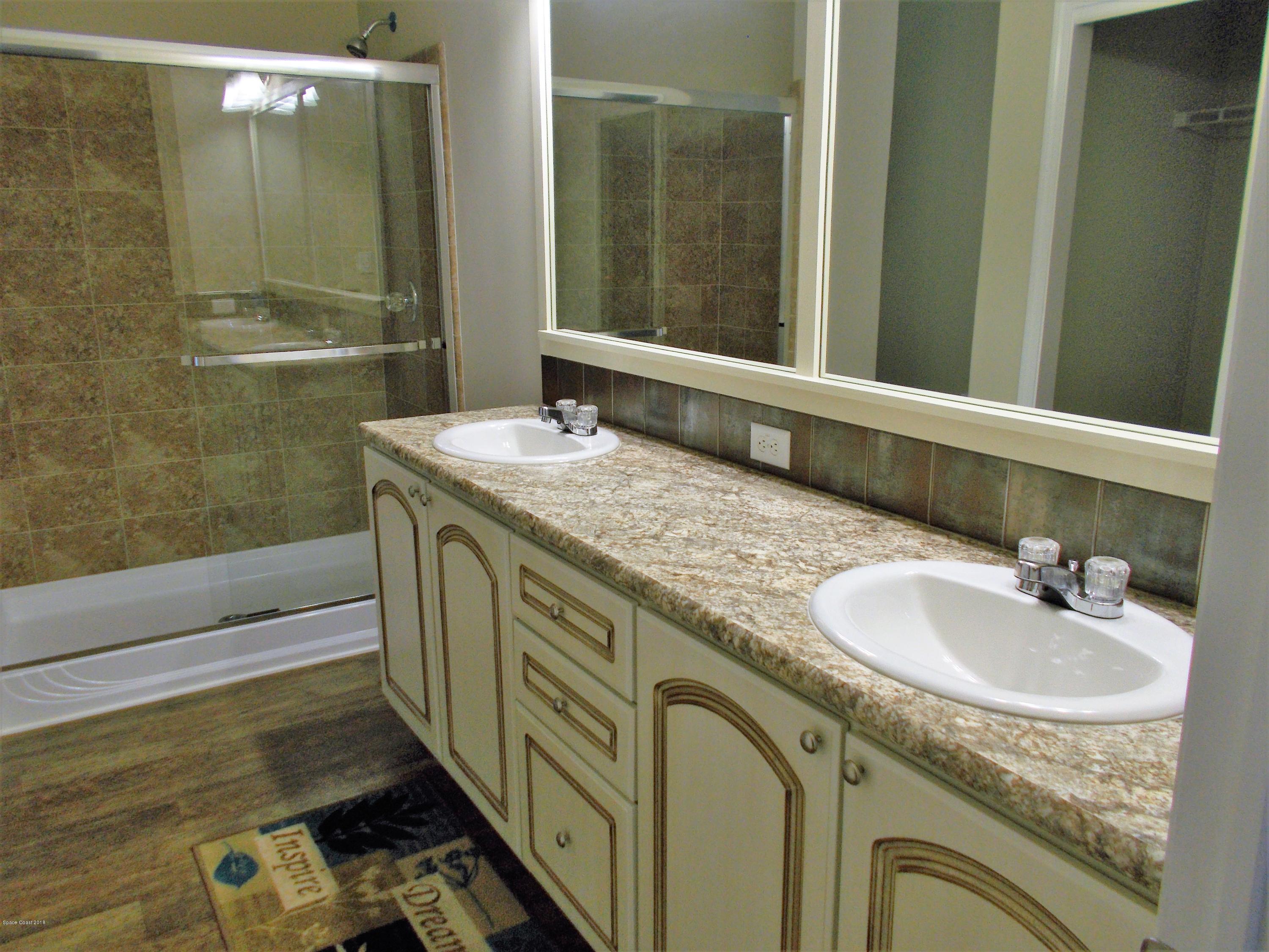 1054 Sebastian Road Barefoot Bay, FL 32976 - Photo 13 of 24 MASTER BATH