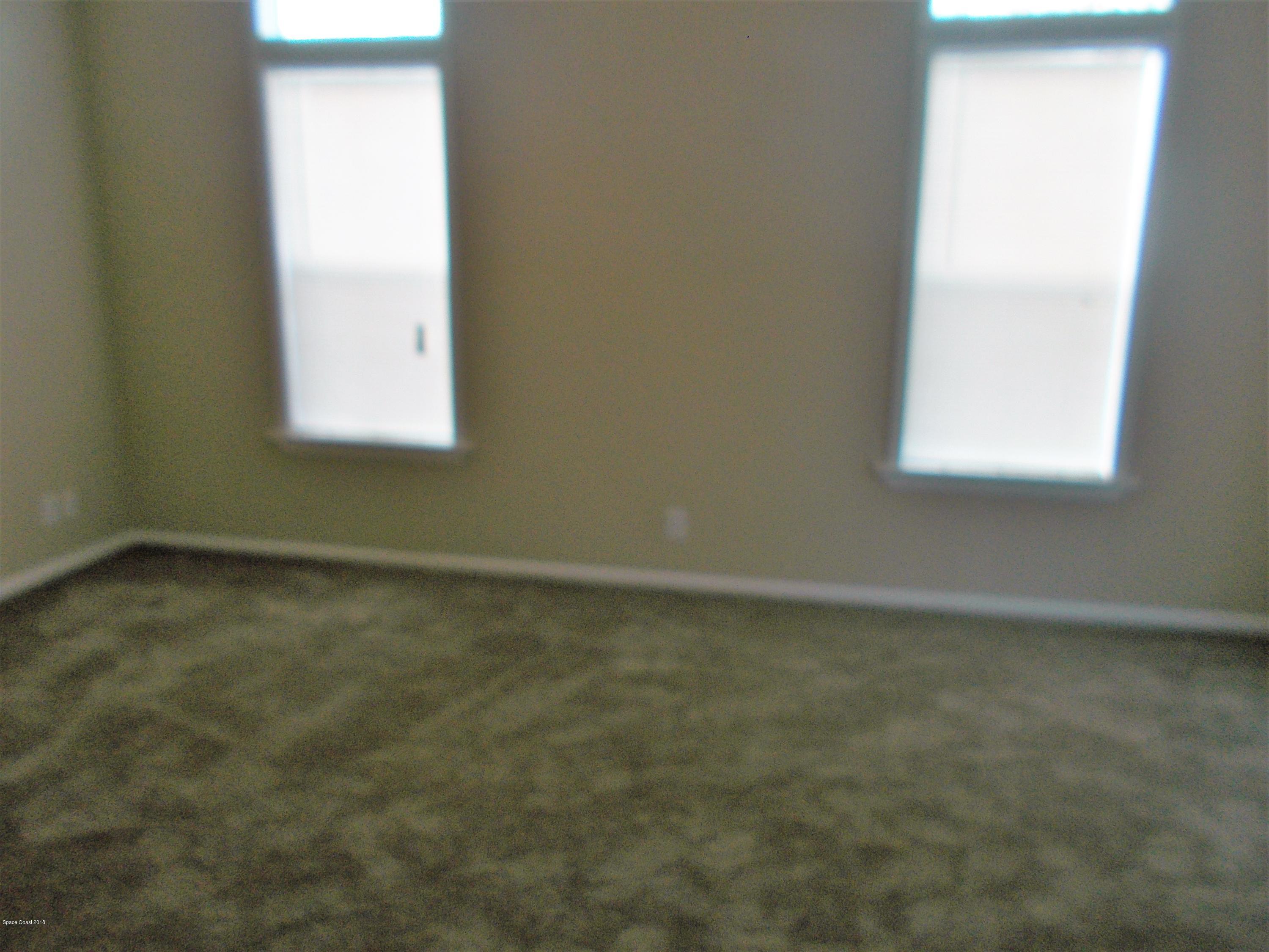 1054 Sebastian Road Barefoot Bay, FL 32976 - Photo 18 of 24 GUEST ROOM