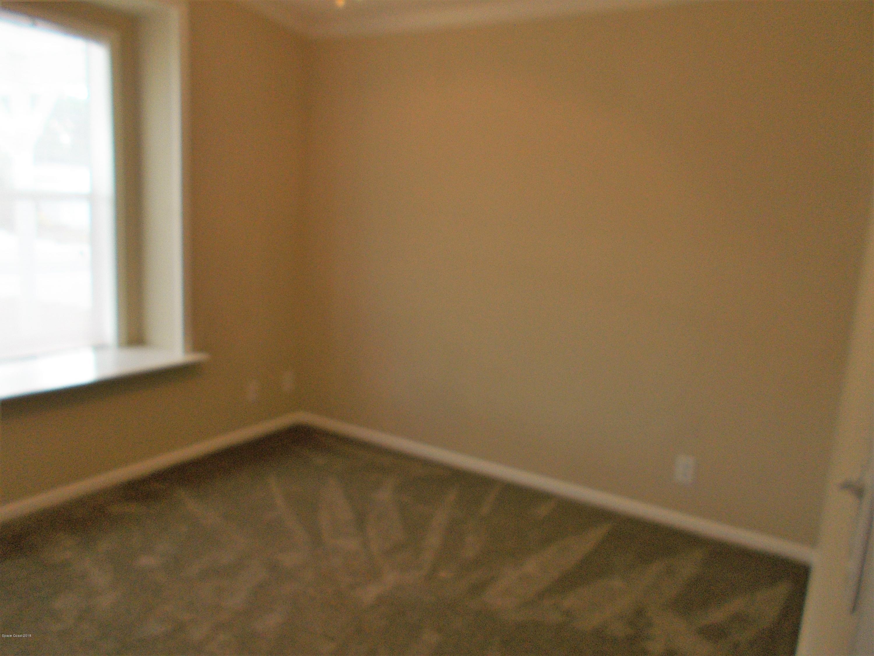 1054 Sebastian Road Barefoot Bay, FL 32976 - Photo 19 of 24 GUEST ROOM