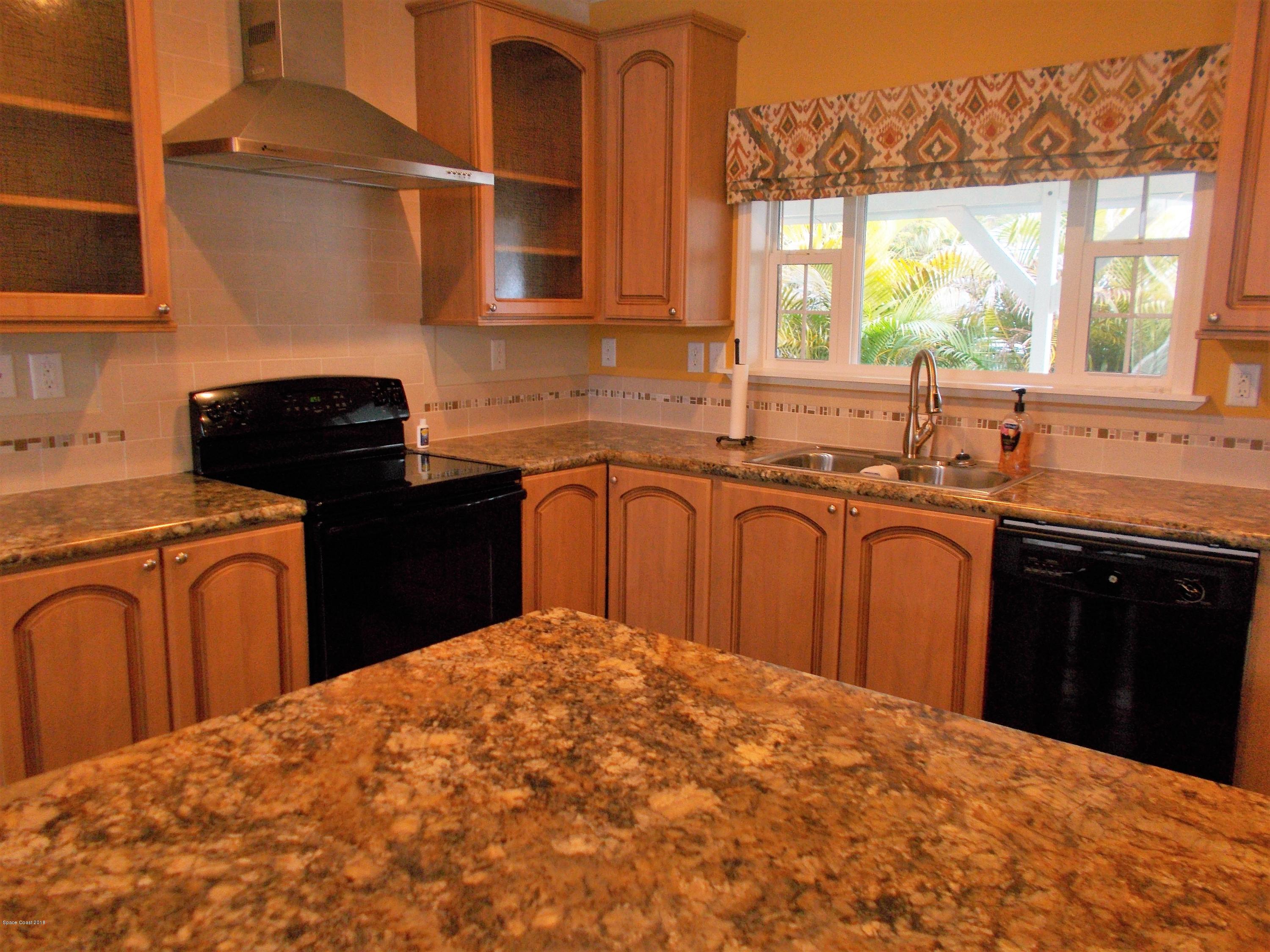 1054 Sebastian Road Barefoot Bay, FL 32976 - Photo 8 of 24 LARGE KITCHEN