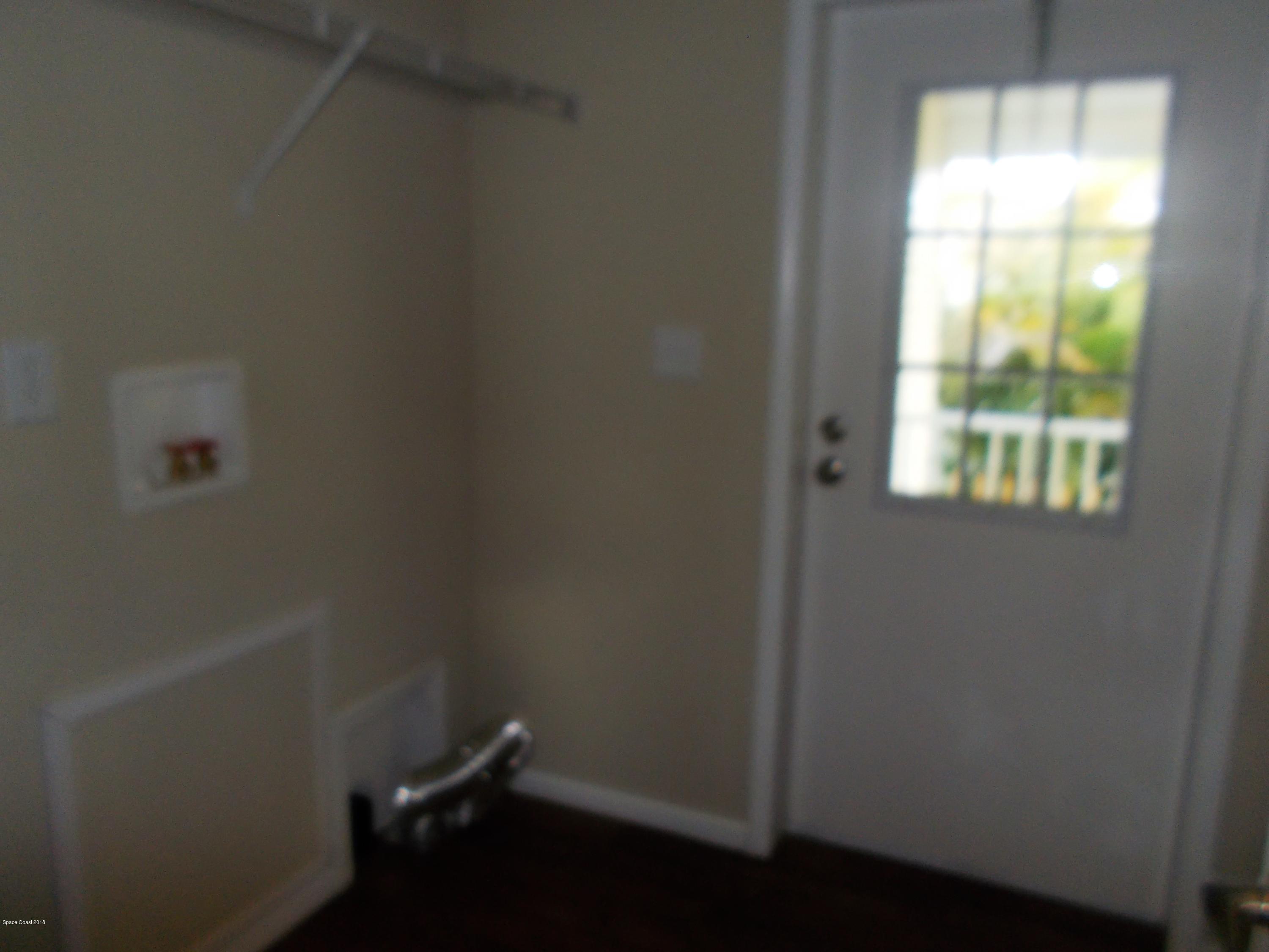 1054 Sebastian Road Barefoot Bay, FL 32976 - Photo 9 of 24 INSIDE LAUNDRY