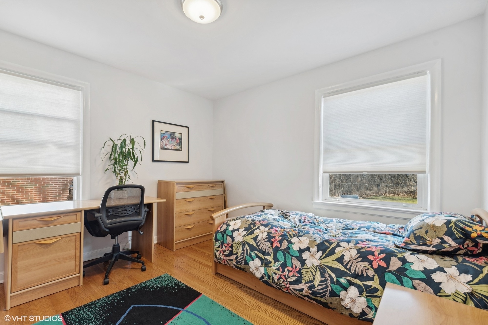 659 Deerpath Drive Deerfield, IL 60015 - Photo 12 of 22 a bedroom with a bed and window