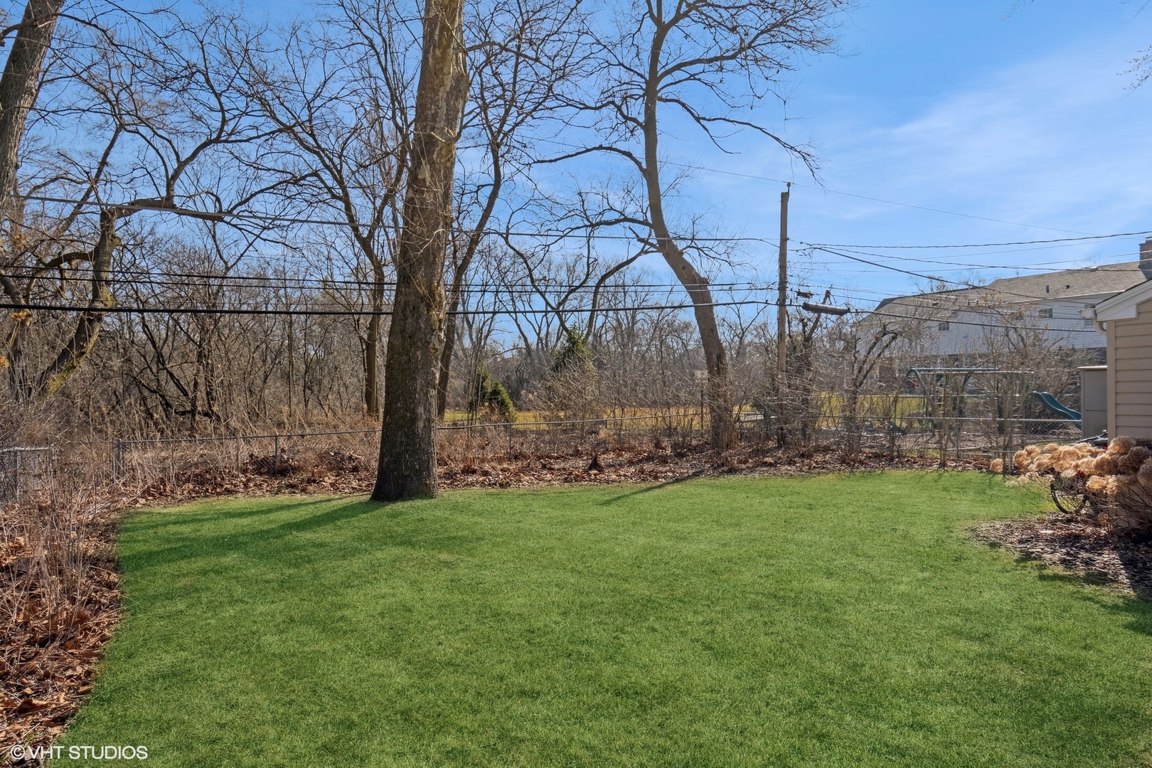 659 Deerpath Drive Deerfield, IL 60015 - Photo 19 of 22 a view of a bench in a backyard