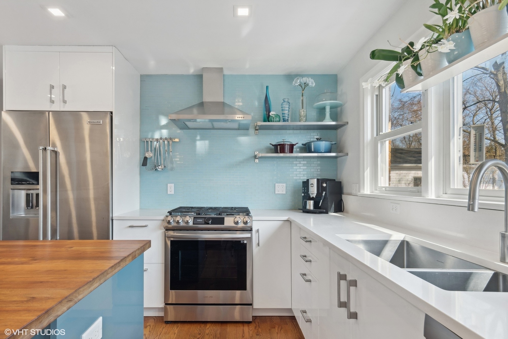 659 Deerpath Drive Deerfield, IL 60015 - Photo 7 of 22 a kitchen with stainless steel appliances granite countertop a sink stove and refrigerator