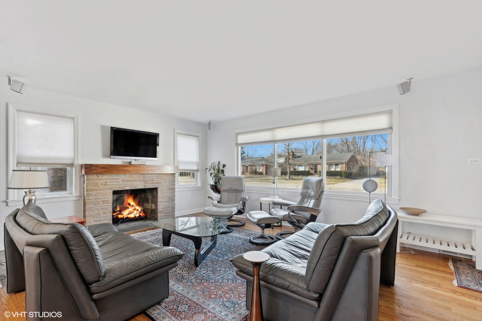 659 Deerpath Drive Deerfield, IL 60015 - Photo 9 of 22 a living room with furniture fireplace and a flat screen tv