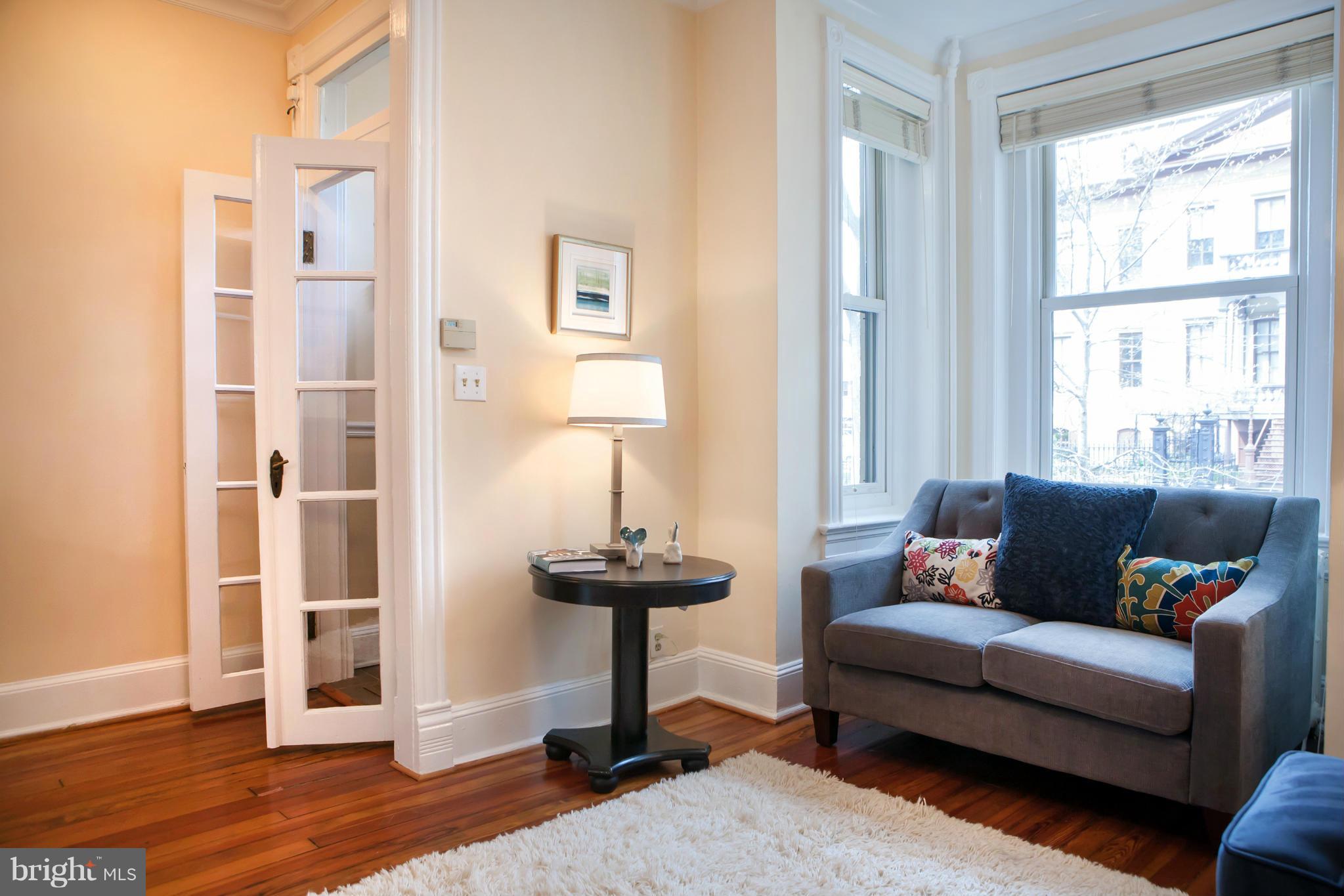 917 E Street Southeast Washington, DC 20003 - Photo 5 of 30 a living room with furniture and a window