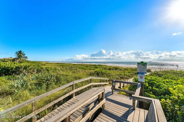 a view of a balcony with city view
