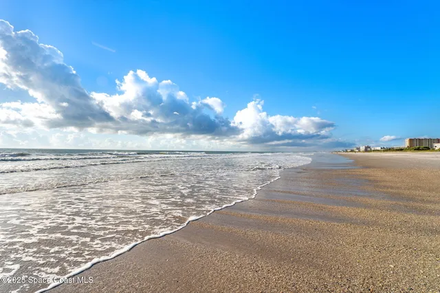 a view of a lake with beach