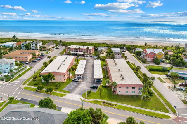 an aerial view of a building with outdoor space