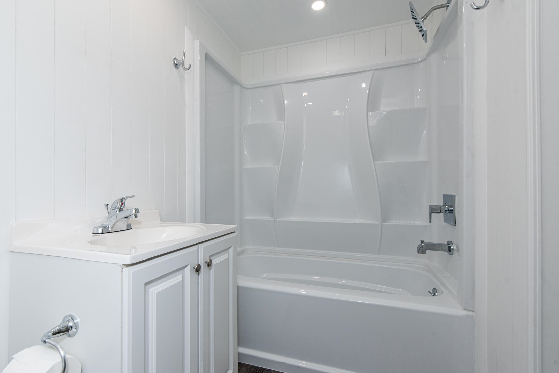 905 Palermo Road St. Augustine, FL 32086 - Photo 13 of 30 a bathroom with a sink a toilet and shower