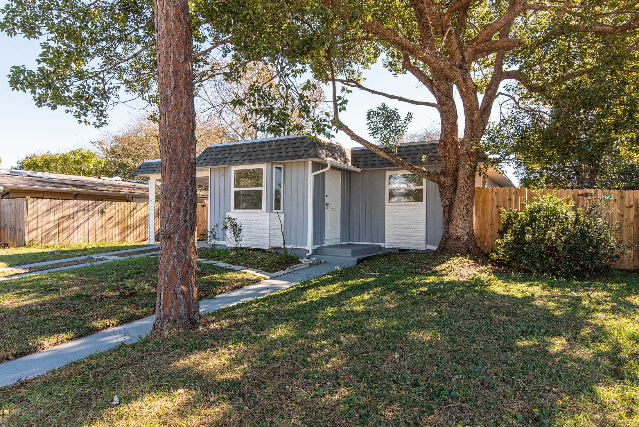 905 Palermo Road St. Augustine, FL 32086 - Photo 2 of 30 a view of a house with backyard and tree