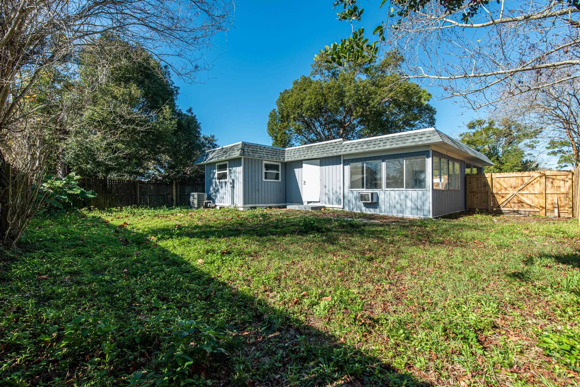905 Palermo Road St. Augustine, FL 32086 - Photo 21 of 30 a view of a house with yard and a garden