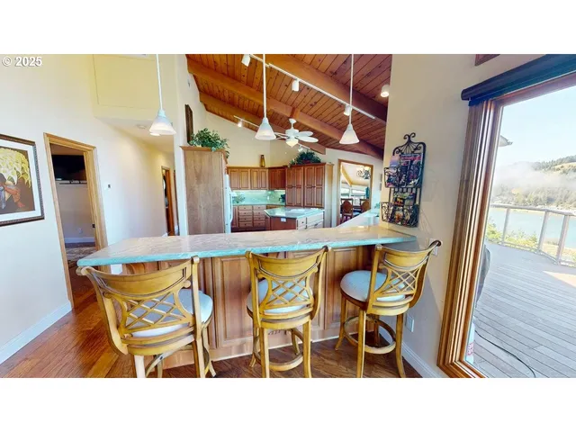 a balcony view with couple of chairs