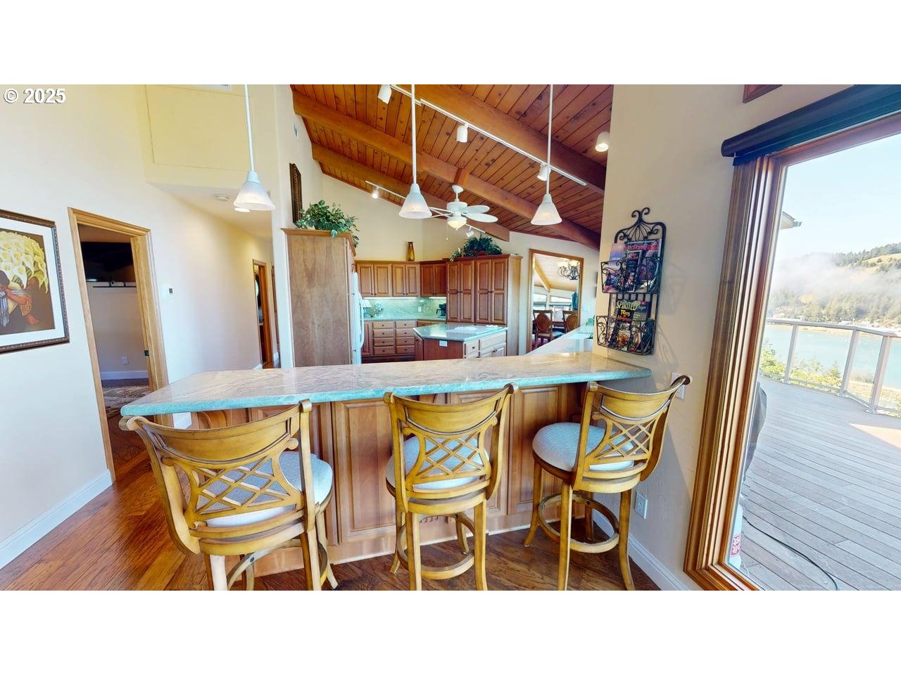 94418 Tom Cat Hill Road Gold Beach, OR 97444 - Photo 14 of 46 a balcony view with couple of chairs