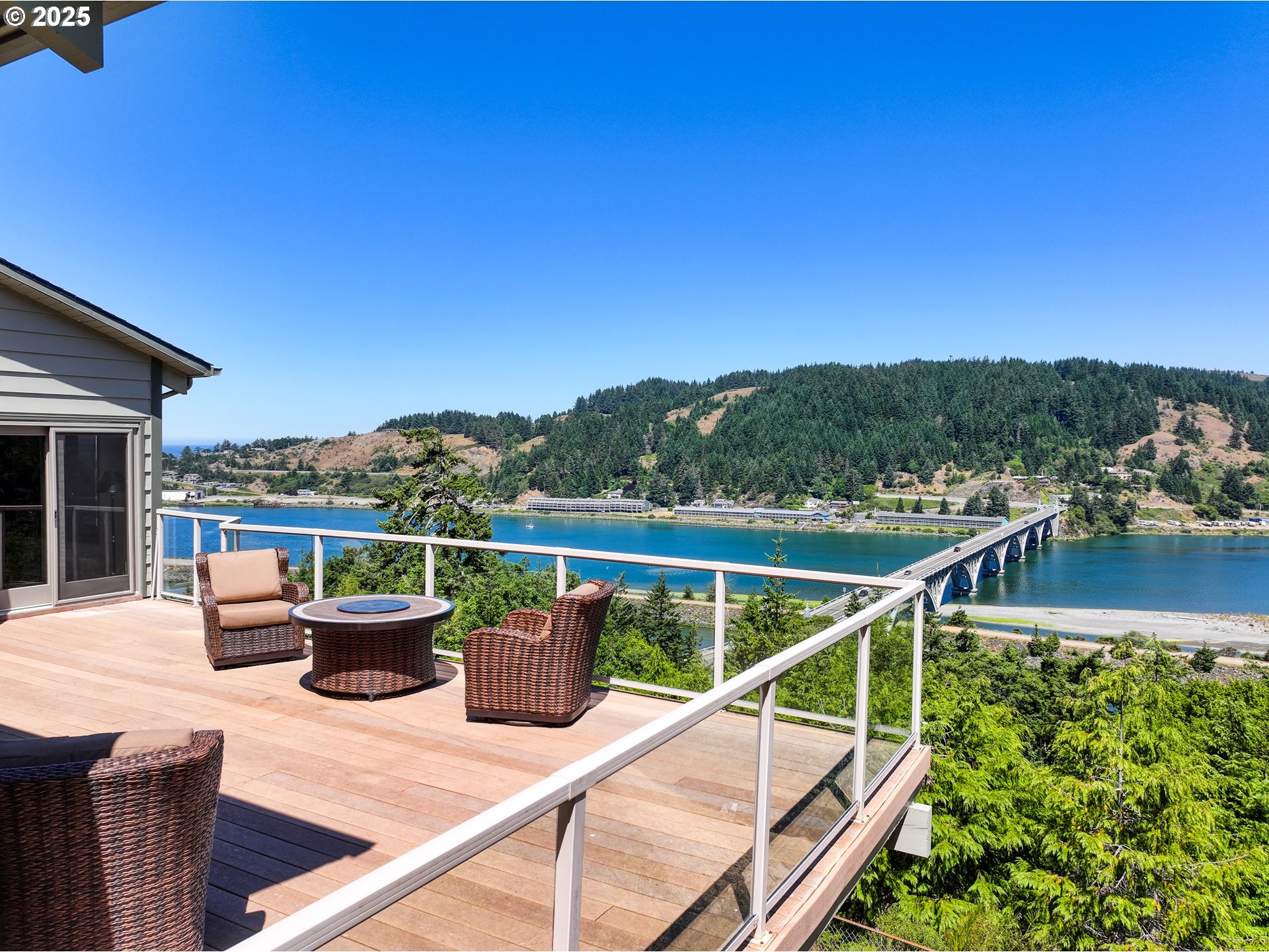 94418 Tom Cat Hill Road Gold Beach, OR 97444 - Photo 31 of 46 a view of a roof deck with couches and sky view